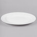 A white Reserve by Libbey bone china oval platter with a rim.