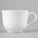 A white Reserve by Libbey bone china coffee cup with a handle.