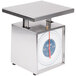 An Edlund stainless steel receiving scale with a blue and white face on a counter.