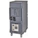 A grey plastic tall profile Cambro food holding cabinet with wheels.