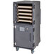 A large grey metal Cambro Pro Cart Ultra holding cabinet with trays inside.