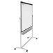 A silver and graphite mobile presentation easel with a white board on a stand.