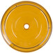 A yellow Cambro Camwear low profile plate cover with a hole in the center.
