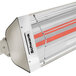 A close-up of a Schwank stainless steel electric patio heater's red light.
