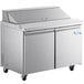 An Avantco stainless steel refrigerated sandwich prep table with 2 doors.