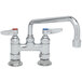 A chrome T&S deck-mounted pantry faucet with two handles and a 10" swing nozzle.