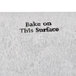 A white TurboChef fiber reinforced baking stone surface with the words "Bake on this surface" in white.
