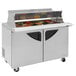 A stainless steel Turbo Air sandwich prep table with two doors.