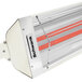 A red and white Schwank 2 stage electric patio heater with a red light.