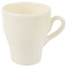 A close-up of an Elite Global Solutions antique white melamine mug with a handle.