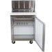 A stainless steel Avantco refrigerated sandwich prep table with a door open.