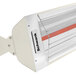 A white Schwank electric patio heater with red light.