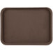 A brown rectangular Carlisle Griptite non-skid serving tray.
