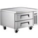 An Avantco stainless steel chef base with two refrigerated drawers on wheels.