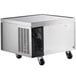 An Avantco stainless steel 2 drawer refrigerated chef base on black wheels.