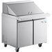 An Avantco stainless steel refrigerated sandwich prep table with two doors.
