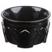 A black Dinex insulated bowl with a carved design.