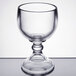 A Libbey clear schooner glass on a table.