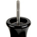 A close-up of a Fletchers' Mill Marsala black pepper mill with a screw on top.