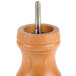 A Fletchers' Mill cherry wood pepper mill with a screw in it.