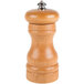 A Fletchers' Mill cherry wooden pepper mill with a metal top.