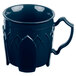 A dark blue Dinex insulated mug with a handle.