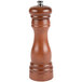 A Fletchers' Mill walnut stain wooden pepper mill with a silver top.