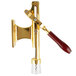 A brass-plated Franmara Bar-Pull wine bottle opener with a wooden handle and gold metal piece.