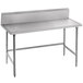 An Advance Tabco stainless steel work table with a backsplash.