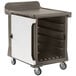 A granite sand plastic Cambro meal delivery cart with white doors.