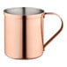 An Acopa Alchemy copper Moscow Mule mug with a stainless steel handle.
