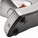 A close-up of a silver and orange Swingline Optima electric stapler.