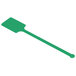 A green plastic rectangular stirrer with a green handle.