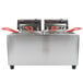 A Cecilware stainless steel electric countertop deep fryer with two 15 lb. fry tanks and red handles.