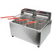 A Cecilware stainless steel electric countertop deep fryer with two red tongs.
