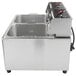 A Cecilware stainless steel electric countertop deep fryer with two fry tanks.