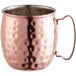 An Acopa Alchemy hammered copper Moscow Mule mug with a handle.