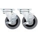 A close-up of a pair of Garland and US Range metal casters with black and grey wheels.