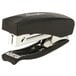 A black and silver Swingline stapler with a black soft grip handle.