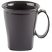 A grey coffee mug with a handle.