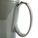 A gray Cambro insulated mug with a handle.