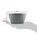 A hand uses a measuring cup to scoop from a white Cambro insulated plastic bowl.