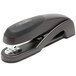 A Swingline Optima 25 Sheet stapler with a black handle.