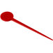 A red plastic disc pick with a round shape and a long handle.