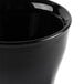 A close-up of a black Cambro insulated bowl.