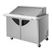 A Turbo Air stainless steel 2 door refrigerated sandwich prep table.