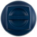A blue plastic dome with a white circle on a blue surface.