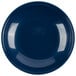 A navy blue Cambro insulated dome plate cover over a white plate.