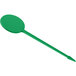 A green plastic stick with a long handle with a long oval tip.