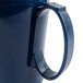 A navy blue Cambro insulated mug with a handle.